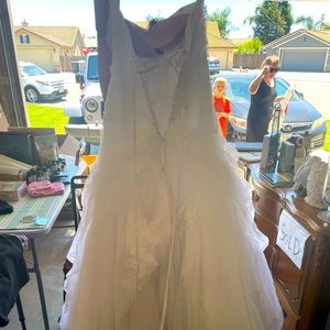 . Sized up to an 8 from a size 6. Adjustable corset back